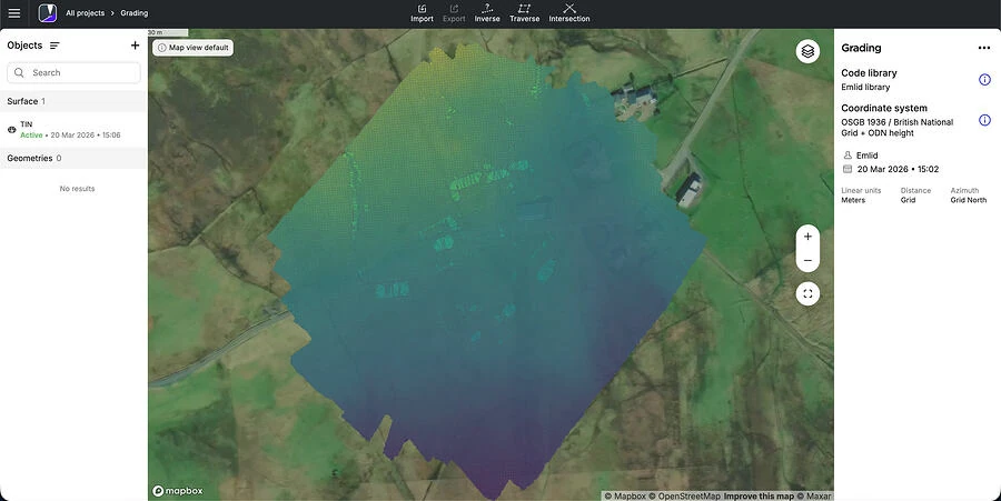 Top-down map view displaying a digital terrain model (TIN) overlaid on satellite imagery, representing drone survey data for a rural site with grading and elevation analysis in surveying software.